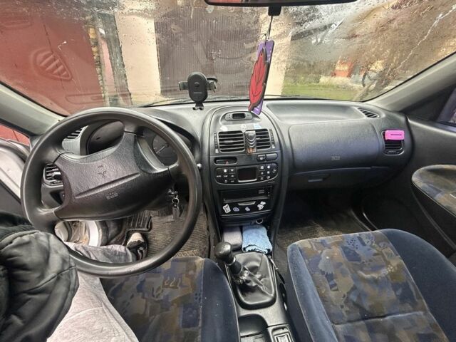 Сірий Міцубісі Харизма, об'ємом двигуна 1.9 л та пробігом 350 тис. км за 1000 $, фото 7 на Automoto.ua