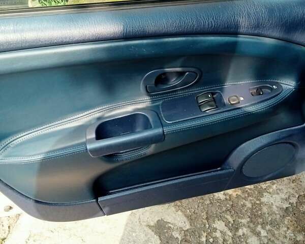 Серый Мицубиси Харизма, объемом двигателя 1.6 л и пробегом 300 тыс. км за 3300 $, фото 4 на Automoto.ua