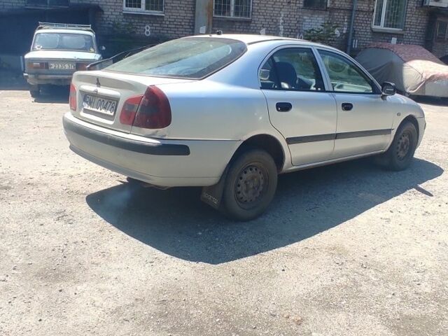 Сірий Міцубісі Харизма, об'ємом двигуна 1.9 л та пробігом 250 тис. км за 800 $, фото 2 на Automoto.ua