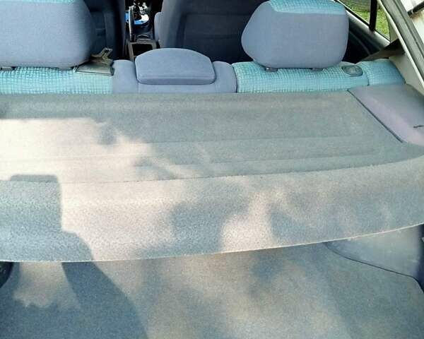 Серый Мицубиси Харизма, объемом двигателя 1.6 л и пробегом 300 тыс. км за 3300 $, фото 9 на Automoto.ua