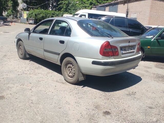 Сірий Міцубісі Харизма, об'ємом двигуна 1.9 л та пробігом 250 тис. км за 800 $, фото 3 на Automoto.ua