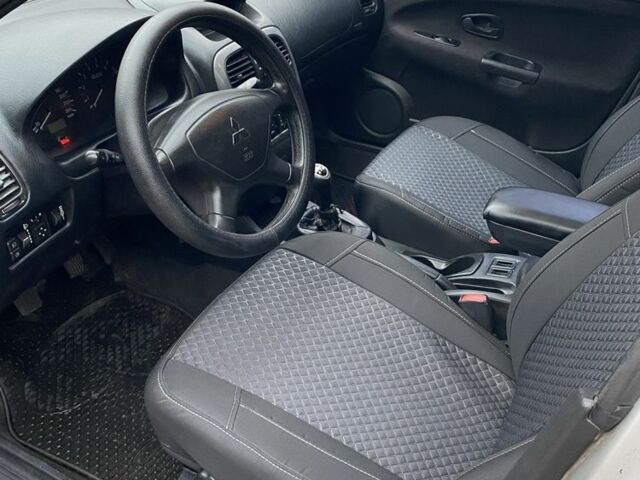 Серый Мицубиси Харизма, объемом двигателя 1.8 л и пробегом 265 тыс. км за 2850 $, фото 13 на Automoto.ua