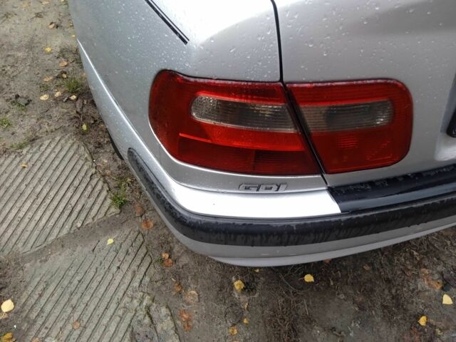 Серый Мицубиси Харизма, объемом двигателя 1.8 л и пробегом 224 тыс. км за 3600 $, фото 11 на Automoto.ua