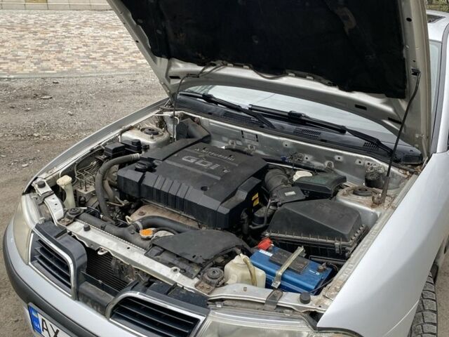 Серый Мицубиси Харизма, объемом двигателя 1.8 л и пробегом 265 тыс. км за 2850 $, фото 19 на Automoto.ua