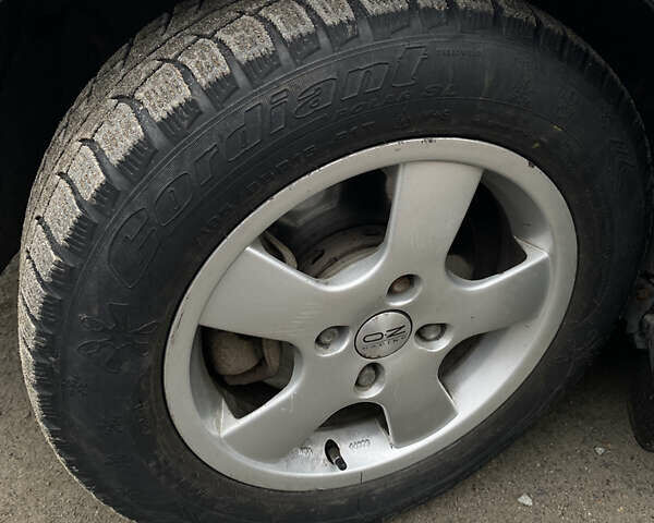 Сірий Міцубісі Харизма, об'ємом двигуна 1.83 л та пробігом 265 тис. км за 2850 $, фото 21 на Automoto.ua