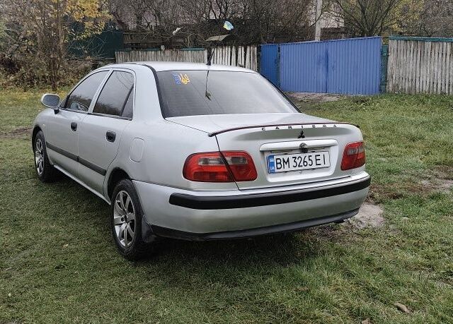 Серый Мицубиси Харизма, объемом двигателя 1.6 л и пробегом 250 тыс. км за 2600 $, фото 5 на Automoto.ua