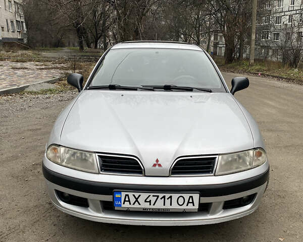 Сірий Міцубісі Харизма, об'ємом двигуна 1.83 л та пробігом 265 тис. км за 2850 $, фото 11 на Automoto.ua