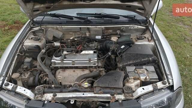 Серый Мицубиси Харизма, объемом двигателя 1.6 л и пробегом 250 тыс. км за 2600 $, фото 17 на Automoto.ua