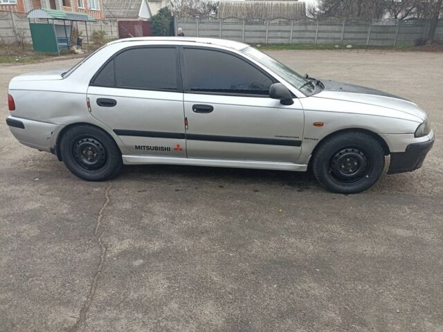 Сірий Міцубісі Харизма, об'ємом двигуна 1.8 л та пробігом 371 тис. км за 2200 $, фото 2 на Automoto.ua