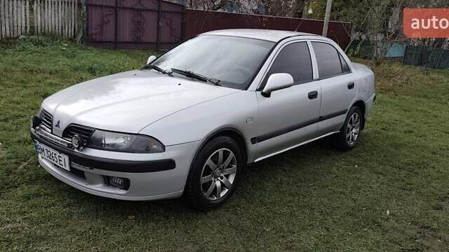 Серый Мицубиси Харизма, объемом двигателя 1.6 л и пробегом 250 тыс. км за 2600 $, фото 3 на Automoto.ua