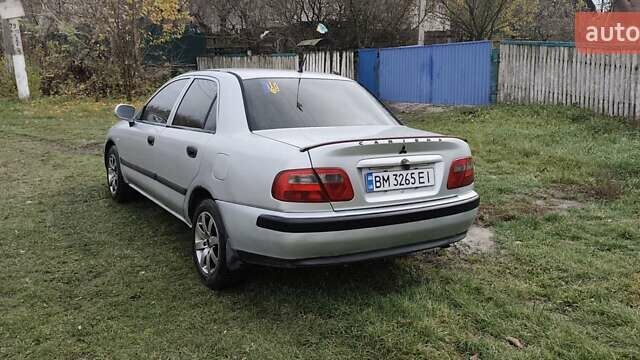 Серый Мицубиси Харизма, объемом двигателя 1.6 л и пробегом 250 тыс. км за 2600 $, фото 9 на Automoto.ua