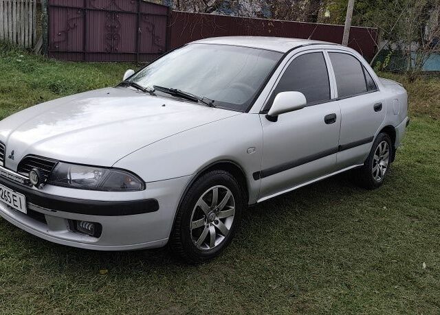 Серый Мицубиси Харизма, объемом двигателя 1.6 л и пробегом 250 тыс. км за 2600 $, фото 7 на Automoto.ua