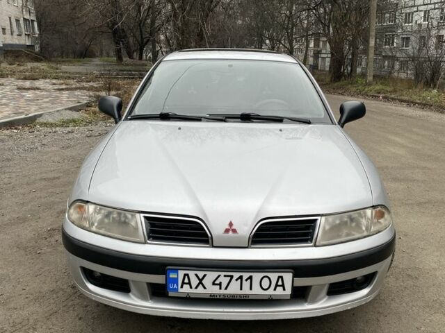 Серый Мицубиси Харизма, объемом двигателя 1.8 л и пробегом 265 тыс. км за 2850 $, фото 11 на Automoto.ua
