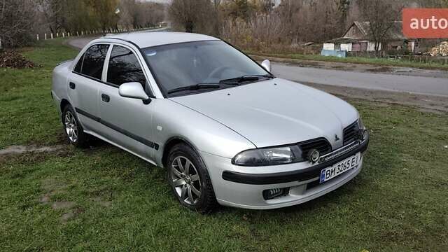 Серый Мицубиси Харизма, объемом двигателя 1.6 л и пробегом 250 тыс. км за 2600 $, фото 5 на Automoto.ua