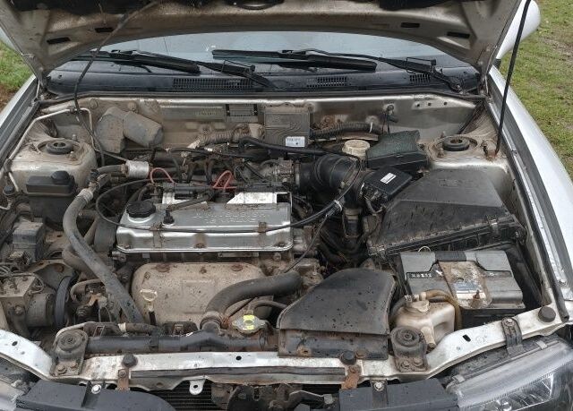 Серый Мицубиси Харизма, объемом двигателя 1.6 л и пробегом 250 тыс. км за 2600 $, фото 18 на Automoto.ua