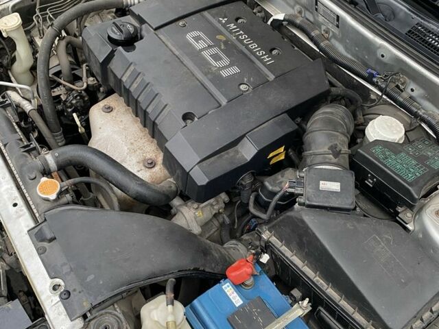 Серый Мицубиси Харизма, объемом двигателя 1.8 л и пробегом 265 тыс. км за 2850 $, фото 20 на Automoto.ua