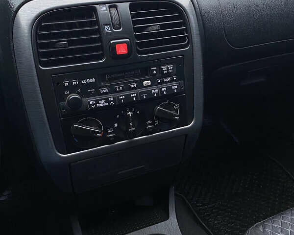 Сірий Міцубісі Харизма, об'ємом двигуна 1.83 л та пробігом 265 тис. км за 2850 $, фото 18 на Automoto.ua