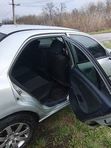 Серый Мицубиси Харизма, объемом двигателя 1.6 л и пробегом 250 тыс. км за 2600 $, фото 14 на Automoto.ua