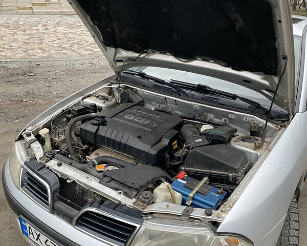 Сірий Міцубісі Харизма, об'ємом двигуна 1.83 л та пробігом 265 тис. км за 2850 $, фото 19 на Automoto.ua