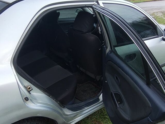 Серый Мицубиси Харизма, объемом двигателя 1.6 л и пробегом 250 тыс. км за 2600 $, фото 15 на Automoto.ua