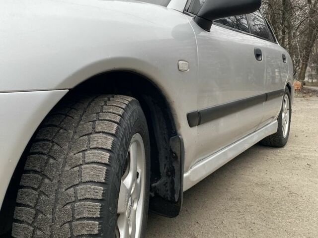 Серый Мицубиси Харизма, объемом двигателя 1.8 л и пробегом 265 тыс. км за 2850 $, фото 10 на Automoto.ua