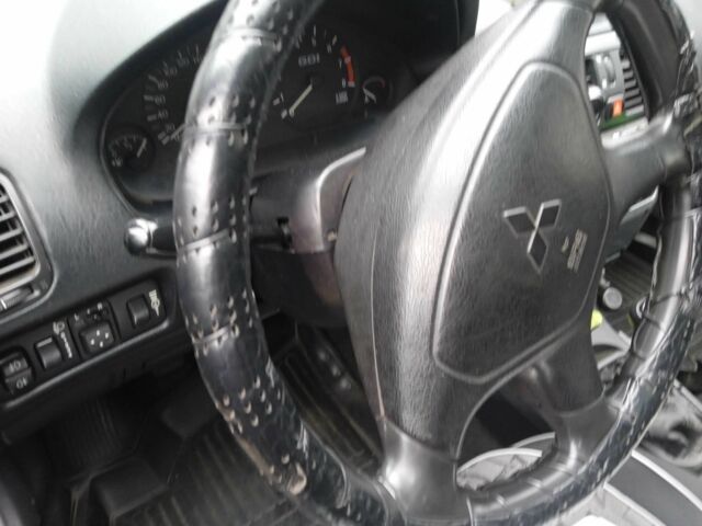 Серый Мицубиси Харизма, объемом двигателя 1.8 л и пробегом 224 тыс. км за 3600 $, фото 7 на Automoto.ua