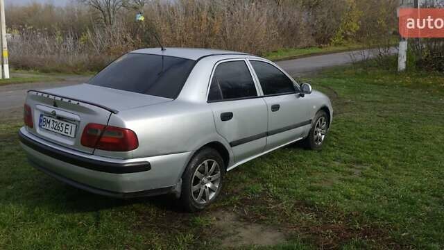 Серый Мицубиси Харизма, объемом двигателя 1.6 л и пробегом 250 тыс. км за 2600 $, фото 6 на Automoto.ua