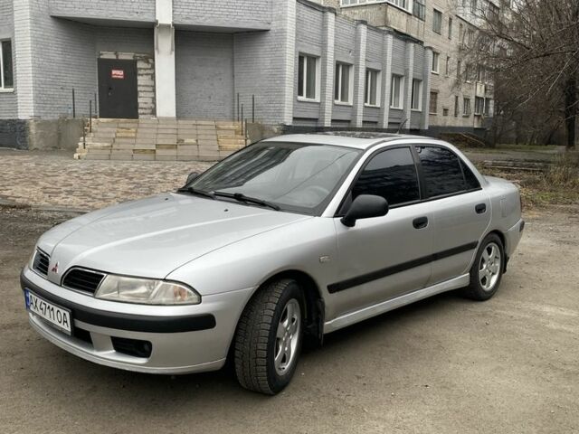 Серый Мицубиси Харизма, объемом двигателя 1.8 л и пробегом 265 тыс. км за 2850 $, фото 9 на Automoto.ua