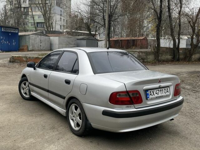 Серый Мицубиси Харизма, объемом двигателя 1.8 л и пробегом 265 тыс. км за 2850 $, фото 6 на Automoto.ua