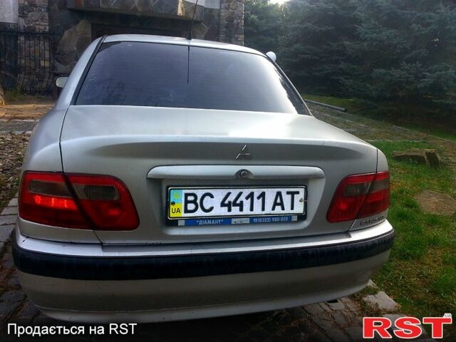 Серый Мицубиси Харизма, объемом двигателя 1.6 л и пробегом 310 тыс. км за 2150 $, фото 2 на Automoto.ua