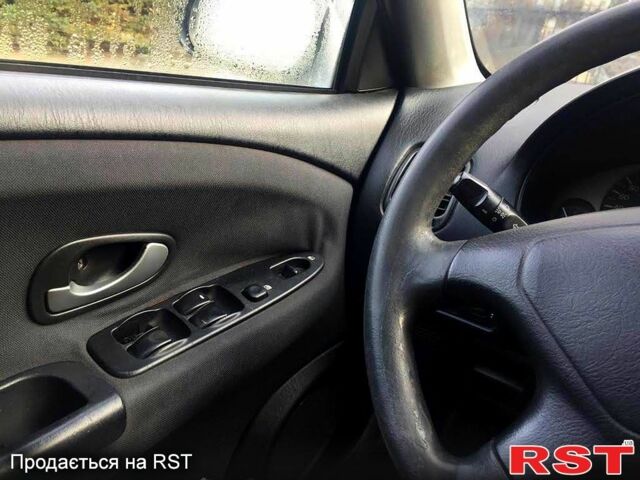 Серый Мицубиси Харизма, объемом двигателя 1.6 л и пробегом 310 тыс. км за 2150 $, фото 6 на Automoto.ua