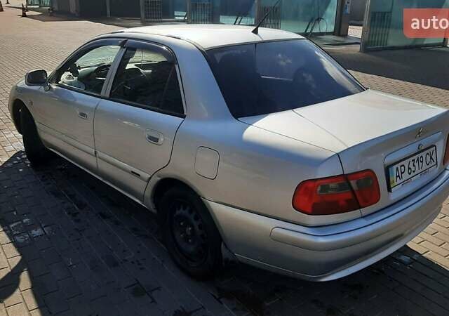 Сірий Міцубісі Харизма, об'ємом двигуна 1.6 л та пробігом 340 тис. км за 2099 $, фото 6 на Automoto.ua