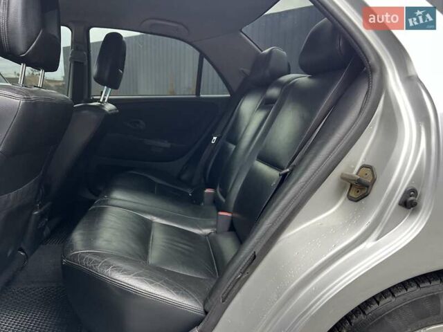 Серый Мицубиси Харизма, объемом двигателя 1.83 л и пробегом 326 тыс. км за 3400 $, фото 7 на Automoto.ua