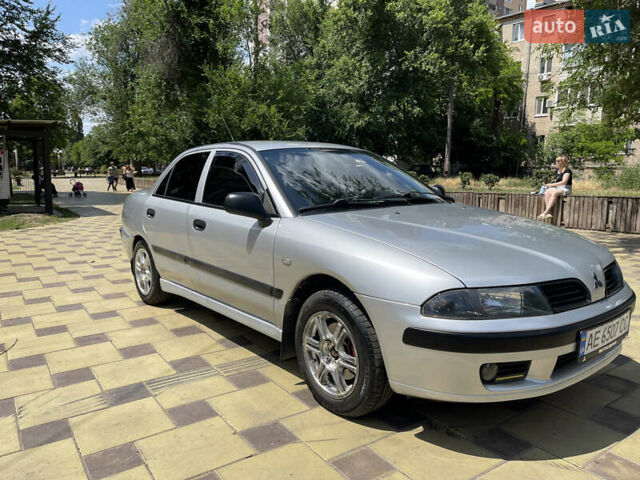 Серый Мицубиси Харизма, объемом двигателя 1.6 л и пробегом 277 тыс. км за 3700 $, фото 4 на Automoto.ua