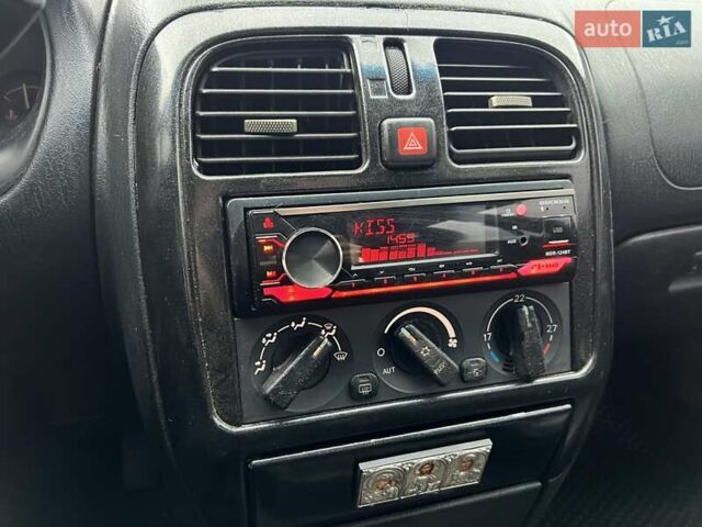 Серый Мицубиси Харизма, объемом двигателя 1.83 л и пробегом 326 тыс. км за 3400 $, фото 14 на Automoto.ua