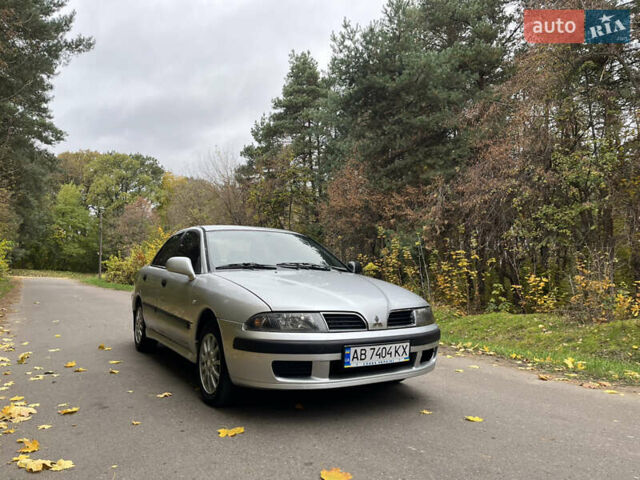 Серый Мицубиси Харизма, объемом двигателя 1.6 л и пробегом 178 тыс. км за 3200 $, фото 1 на Automoto.ua