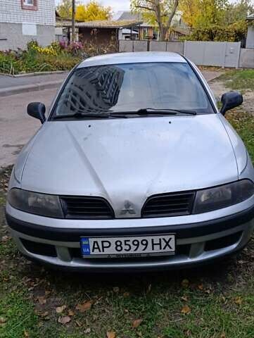 Серый Мицубиси Харизма, объемом двигателя 1.6 л и пробегом 226 тыс. км за 3000 $, фото 2 на Automoto.ua