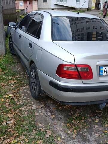 Серый Мицубиси Харизма, объемом двигателя 1.6 л и пробегом 226 тыс. км за 3000 $, фото 3 на Automoto.ua