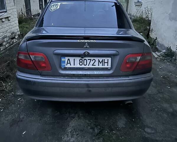 Сірий Міцубісі Харизма, об'ємом двигуна 1.6 л та пробігом 380 тис. км за 3087 $, фото 3 на Automoto.ua