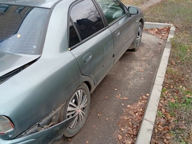 Сірий Міцубісі Харизма, об'ємом двигуна 1.6 л та пробігом 3 тис. км за 2000 $, фото 3 на Automoto.ua