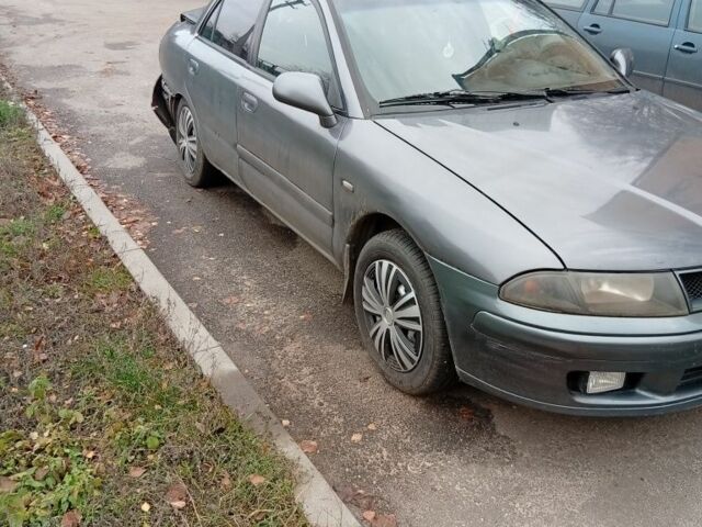 Сірий Міцубісі Харизма, об'ємом двигуна 1.6 л та пробігом 3 тис. км за 2000 $, фото 2 на Automoto.ua