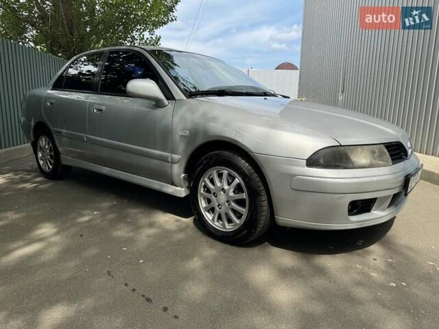 Сірий Міцубісі Харизма, об'ємом двигуна 1.6 л та пробігом 157 тис. км за 5200 $, фото 2 на Automoto.ua