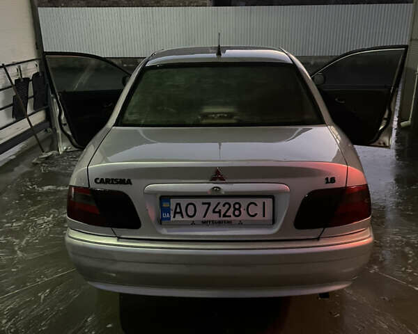 Серый Мицубиси Харизма, объемом двигателя 1.6 л и пробегом 300 тыс. км за 2800 $, фото 5 на Automoto.ua