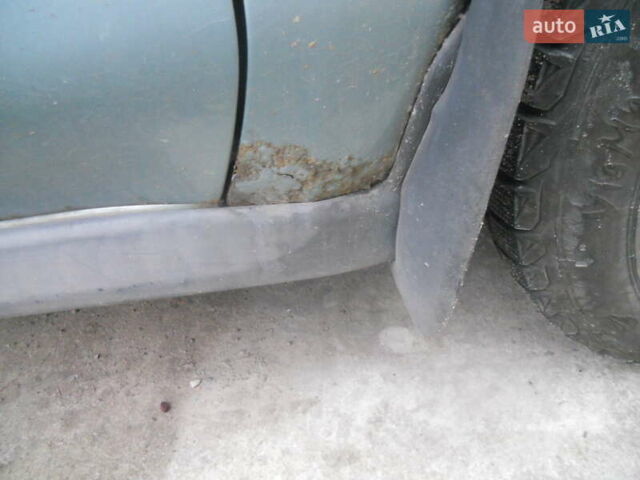 Сірий Міцубісі Харизма, об'ємом двигуна 1.6 л та пробігом 275 тис. км за 2450 $, фото 7 на Automoto.ua