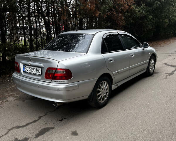 Серый Мицубиси Харизма, объемом двигателя 1.6 л и пробегом 267 тыс. км за 3700 $, фото 2 на Automoto.ua