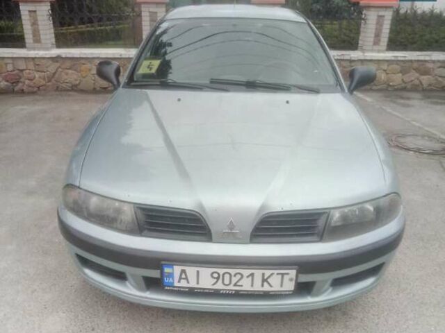 Сірий Міцубісі Харизма, об'ємом двигуна 1.6 л та пробігом 275 тис. км за 2450 $, фото 2 на Automoto.ua
