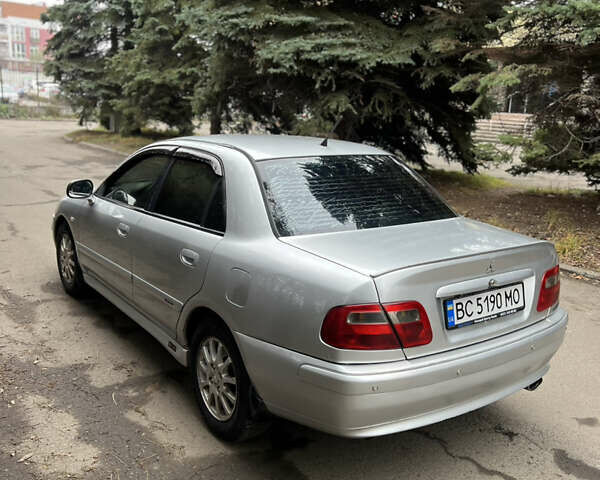 Серый Мицубиси Харизма, объемом двигателя 1.6 л и пробегом 267 тыс. км за 3700 $, фото 3 на Automoto.ua