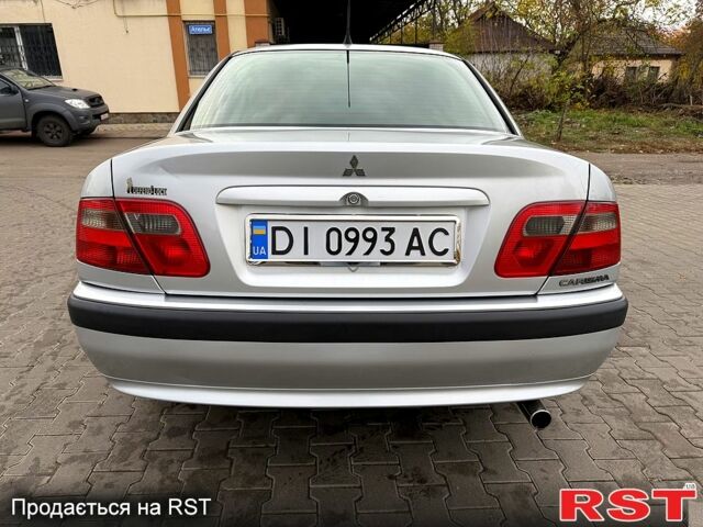 Сірий Міцубісі Харизма, об'ємом двигуна 1.6 л та пробігом 184 тис. км за 3900 $, фото 5 на Automoto.ua