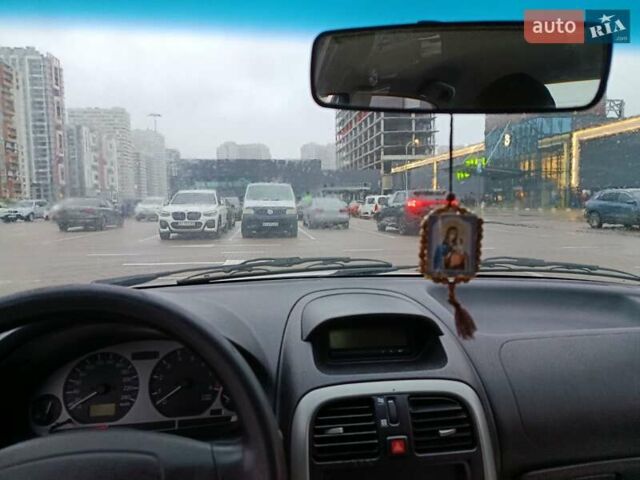 Сірий Міцубісі Харизма, об'ємом двигуна 1.6 л та пробігом 212 тис. км за 3700 $, фото 10 на Automoto.ua