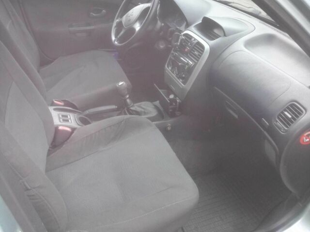 Сірий Міцубісі Харизма, об'ємом двигуна 0 л та пробігом 275 тис. км за 2309 $, фото 2 на Automoto.ua